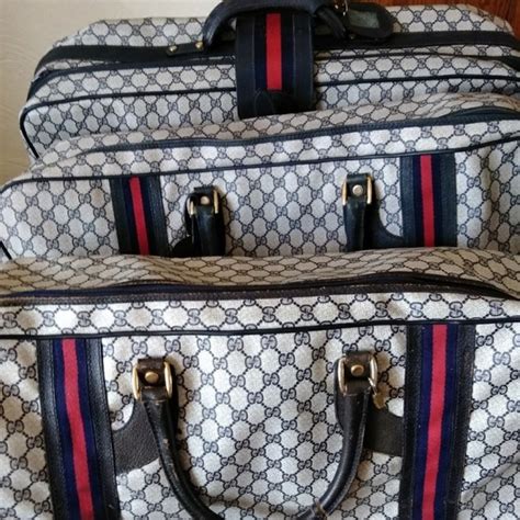 gucci luggage sets.